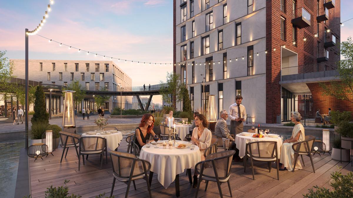 В центре Минска появится необычный дом с пешеходным мостом внутри. Как он будет выглядеть