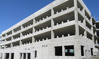 Под Минском за долги известного застройщика продают незавершенный бизнес-центр