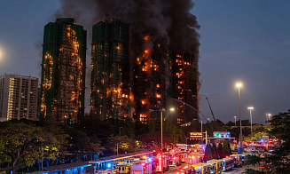 При пожаре в жилом комплексе Гонконга погибли 128 человек. Что известно