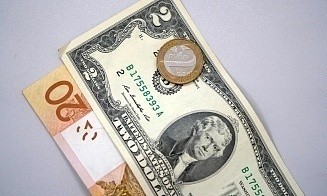 Доллар начал неделю с роста сразу на 4 копейки